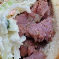 Chopped Cheese Corned Beef · Chopped grilled Corned beef, melted white Swiss American cheese, Russian dressing and colesl...