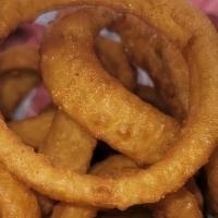 Battered Onion Rings · beer battered onion rings served with side of YKS Sauce.