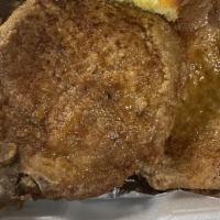 Pork Chops And Fries · 2 Delicious golden fried pork chops and house seasoned fries with or without bbq, hot, gold,...