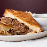 The Big Dipper · Slow roasted beef served on a baguette with a side of homemade au jus for dunking, er, we me...