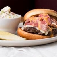 The Benji Burger · All beef hand-made patty burger with slices of hand-carved corned beef, Swiss cheese, sauer-...