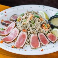Blackened Ahi Tuna · Hot. Thin strips of blackened ahi tuna seared rare and served over buckwheat soba noodles to...
