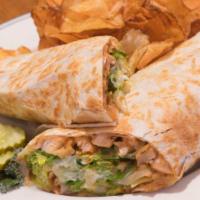 Bbq Chicken Wrap · Claim company signature item. Grilled BBQ chicken breast with fried onion straws, romaine le...