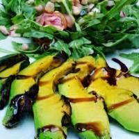 Avocado Salad · Avocado, mixed green and mango with crushed peanuts on top.