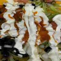 Supreme Nachos · Tomato, onion, black olive, jalapeño pepper, lettuce, sour cream, nachos cheese,  salsa. Gro...