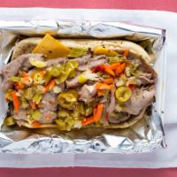 Italian Beef Sandwich · Serve with jalapeño OR hot pepper OR  MILD PEPPER
DIP THE BREAD , OR NO DIP