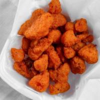 12Pc Chicken Spicy Nuggets · Served With Fries , Bread, Coleslaw