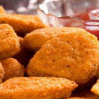 Chicken Nuggets 20 Pc · Served with fries,bread,coleslaw