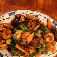 Triple Delight · Jumbo shrimp, beef, and chicken with mixed vegetables cooked in tasty brown flavored sauce.