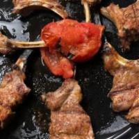 Kabob Kubideh Lunch · Ground lamb and beef skewers marinated in onions and spices, grilled over an open flame. Ser...