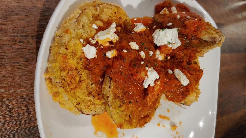 Fried Green Tomatoes · Roasted red pepper crawfish sauce, goat & blue cheese mousse.