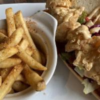 Po' Boys · Fried Shrimp, Oysters, or Catfish topped with Remoulade sauce, Southern Coleslaw, lettuce & ...