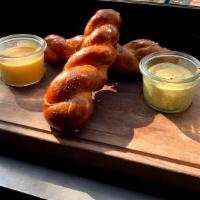 Twisted Pretzels · Vegetarian. Hand-rolled, sea salt, cheddar fondue, beer mustard.