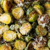 Parmesan Brussels Sprouts · crispy brussels sprouts / olive oil / garlic / charred parmesan crust.