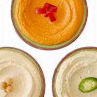Hommus · Choose our traditional, roasted red pepper, or jalapeño. (vegan, gluten-free)
