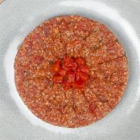 Tomato Kibbeh · diced tomatoes mixed with cracked wheat, minced onion, bell peppers, and spices.  may substi...