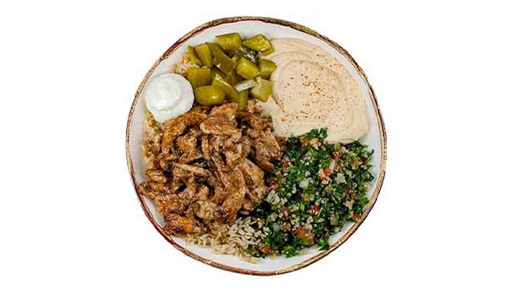Chicken Shawarma Entrée · Marinated chicken breast with brown rice, hommus, tabbouleh, garlic sauce, and pickles. (gluten-free, dairy-free, soy-free, halal)