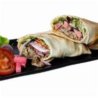 Beef Shawarma Sandwich · Marinated beef with lettuce, tomato, red onion, pickled turnips, and tahini sauce. (dairy-fr...