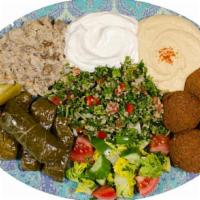 Vegetarian Mezza · A shareable platter that serves two or four. Includes: hommus trio, baba gannouge, tabbouleh...