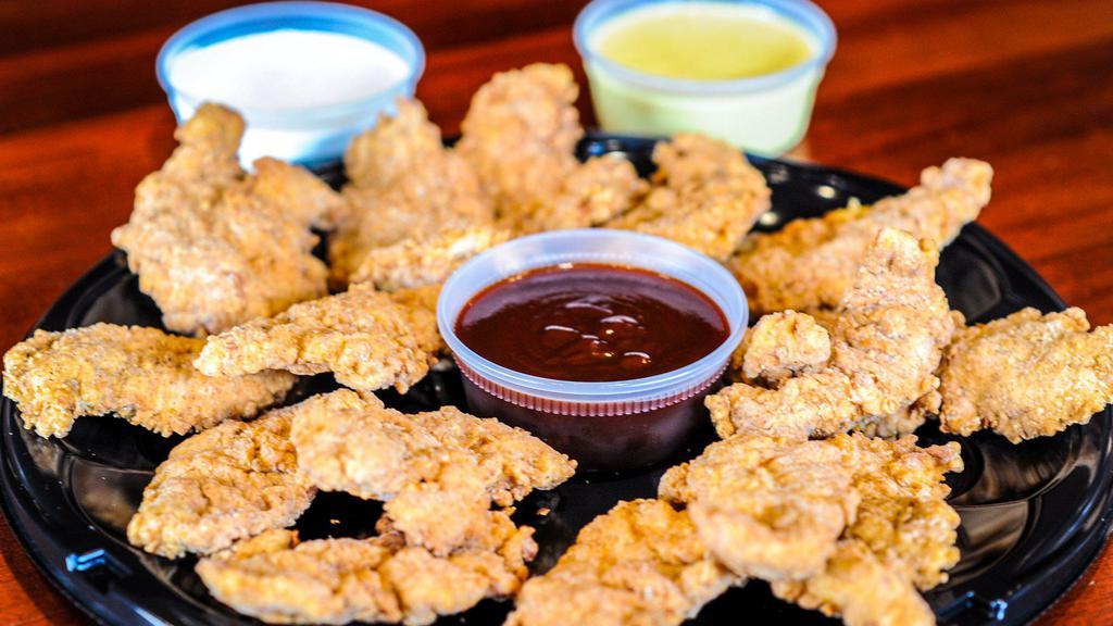 Buttermilk Chicken Tenders · 24 chicken tenders served with ranch, BBQ sauce and honey mustard