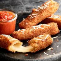 Mozzarella Bricks · Hand-breaded in herb-panko breadcrumbs, lightly fried and served with marinara sauce