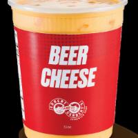 Beer Cheese - Giant · A rich blend of Aged Sharp Cheddar & Wisconsin Cheddar cheeses, mixed with Diced Carrots & i...