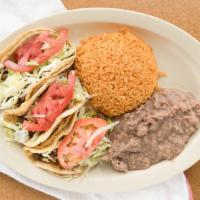 Taco Dinner · Three tacos, steak, chicken, beef