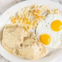 Biscuits & Gravy · Two flaky biscuits topped with savory sausage gravy and served with two eggs any style, hash...