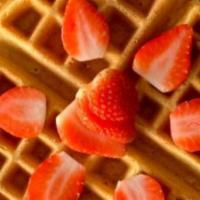 Strawberry Waffle · Our original waffle topped with fresh strawberries and a strawberry glaze.
