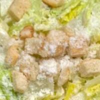 Caesar Salad · Croutons, parmesan, mixed greens, and tomatoes.