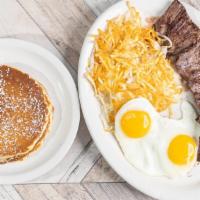 Skirt Steak · Served with two eggs any style, hash browns, and your choice of pancakes or toast.