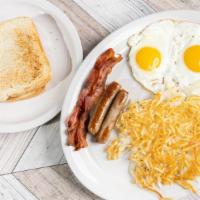 2 Special · Two eggs any style, hash browns, pancakes, two strips of bacon, and two sausage links.