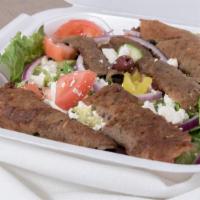 Gyro Salad · Gyro meat, lettuce, tomatoes, sliced cucumbers, onion, olives, crumbled feta cheese & your c...