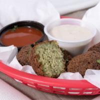 Falafel · Falafel balls with your choice of housemade tahini dipping sauce or housemade hummus.