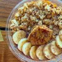 Monkey Bowl · Blended with strawberry, peanut butter, cacao, topped with granola, banana, peanut butter, c...