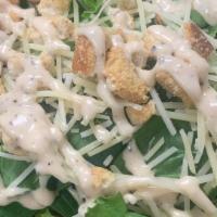 Caesar Salad · Romaine wedge topped with Parmesan, croutons, Caesar dressing.