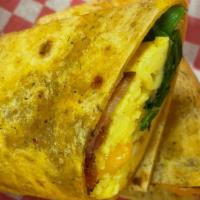 Bacon Breakfast Burrito · Bacon, eggs and cheese with arugula mix wrapped in a whole wheat tortilla