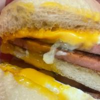 The Chicken And The Pig · Thick cut ham, eggs, and American cheese on ciabatta.