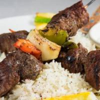 Steak Shish Kabob · Two juicy skewers marinated cubes of filet beef tenderloin. Served with your choice of side,...