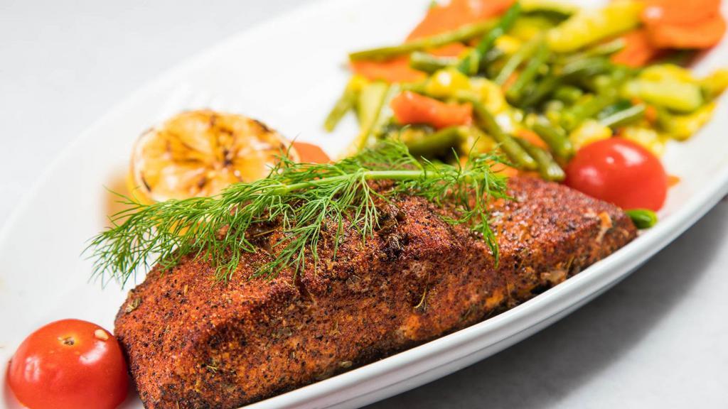 Fresh Blackened Salmon · Lightly blackened and grilled. served with fresh seasonal vegetables.