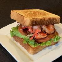 Lobster Blt · Maine lobster tossed in our special house seasoning with lettuce and smoked bacon on tossed ...