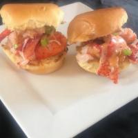 Lobster Sliders · Maine lobster served with fresh lettuce and red onion on toasted brioche buns.