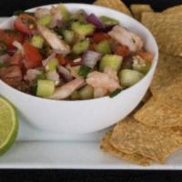 Shrimp Ceviche · 8 oz cup. wild caught shrimp freshly chopped tomato. Cucumber red onion, cilantro and lime .