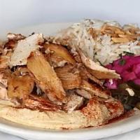 Hummus With Shawarma · Choice of marinated char-broiled chicken or beef.  Consuming raw or undercooked meats,
poult...