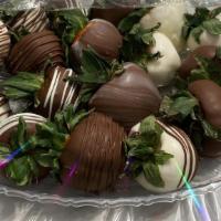 Chocolate Covered Strawberries · Strawberries dipped in milk chocolate or white chocolate.