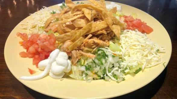Taco Salad · (With your choice of meat) Lettuce, tomato, cheese, guacamole, sour creams, and chips.