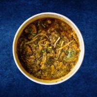 Lamb & Spinach · Boneless lamb morsels simmered in a thick, creamy spinach curry  served with a rice