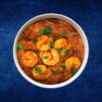 Saucy Shrimp Tikka · Shrimp simmered in a thick, tangy tomato and onion masala gravy served with a rice.