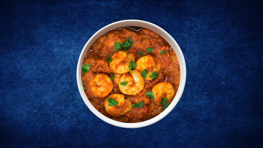 Saucy Shrimp Tikka · Shrimp simmered in a thick, tangy tomato and onion masala gravy served with a rice.