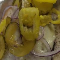The New Yorker  · Hot pastrami, Spicy mustard, Swiss cheese, Sauerkraut, Baked, Topped with, Onions, Pickles &...